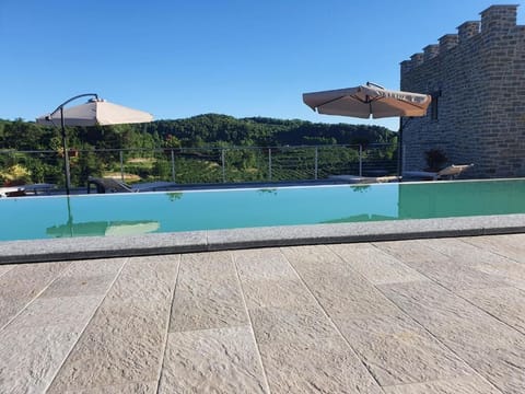 Seasonal outdoor pool, pool umbrellas, sun loungers