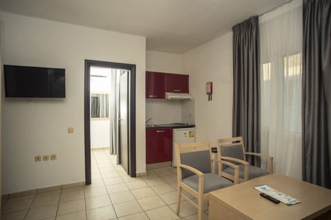 Fridge, stovetop, electric kettle, toaster