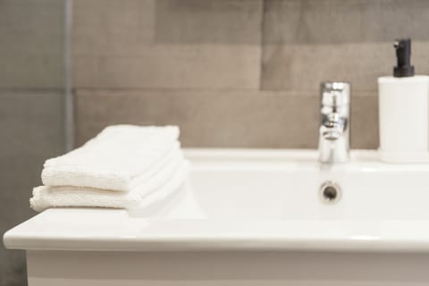 Apartment | Bathroom | Free toiletries, hair dryer, towels, soap