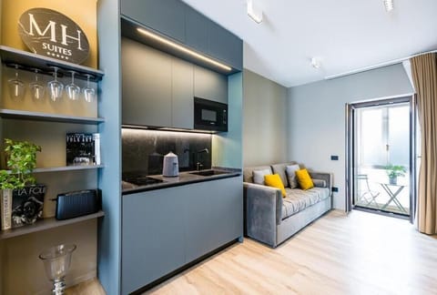 Junior Suite, 1 Queen Bed with Sofa bed, City View | Private kitchen | Mini-fridge, coffee/tea maker