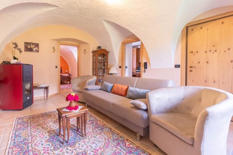 Deluxe Apartment, Balcony, Mountain View | Living area | 50-inch flat-screen TV with cable channels