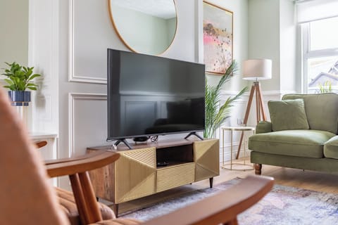 Luxury House | Living area | 52-inch Smart TV with digital channels, Netflix, streaming services