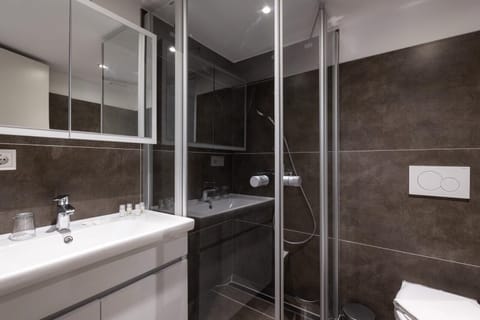 Deluxe Double Room, Courtyard View | Bathroom | Shower, hair dryer, towels, soap