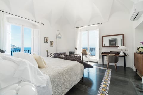 King Suite, Sea View | Hypo-allergenic bedding, down comforters, memory foam beds, minibar