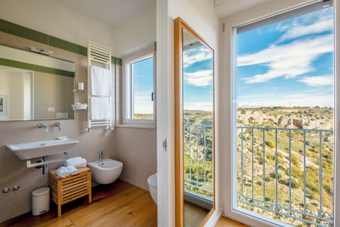 Deluxe Triple Room, City View | Individually decorated, individually furnished, free WiFi