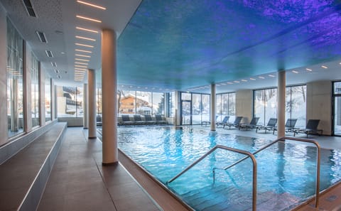 Indoor pool, outdoor pool, pool umbrellas, sun loungers