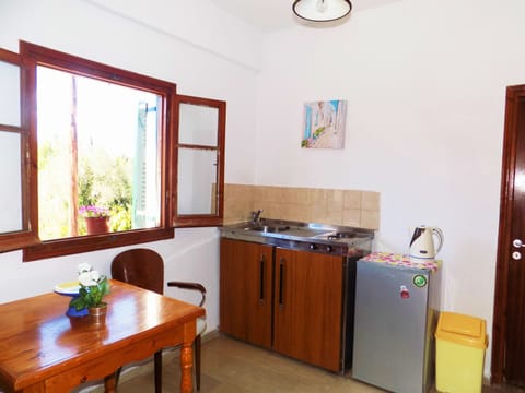 Basic Apartment, 2 Bedrooms, Garden View | Private kitchenette | Fridge, stovetop, electric kettle, cookware/dishes/utensils