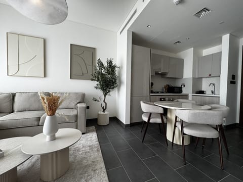 Deluxe Apartment, Balcony, Courtyard View | Living area | 65-inch Smart TV with digital channels, Netflix, streaming services