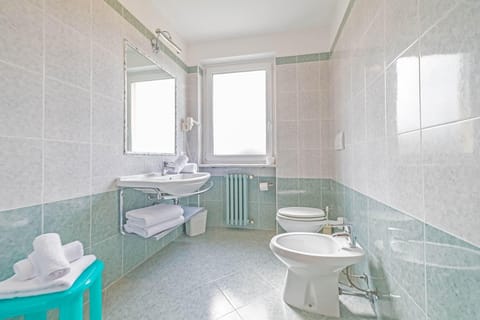 Superior Triple Room | Bathroom | Hair dryer, towels, toilet paper