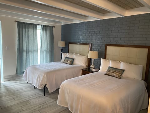 Standard Double Room, 2 Double Beds, Non Smoking | Down comforters, individually decorated, individually furnished