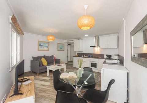 Standard Apartment, Balcony, City View | Living area | TV