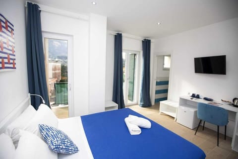 Deluxe Double Room | In-room safe, desk, laptop workspace, blackout drapes