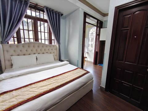 Deluxe Double Room, City View | Blackout drapes, soundproofing, iron/ironing board, free WiFi