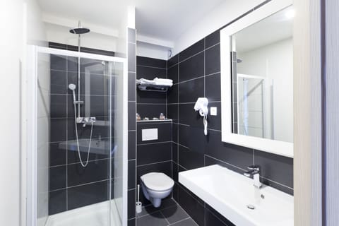 Shower, free toiletries, hair dryer, towels