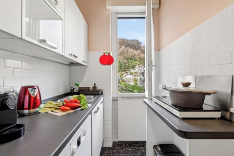 Honeymoon Apartment, Multiple Bedrooms, Mountainside (La Caravella Stresa Lake View) | Private kitchen | Fridge, microwave, stovetop, dishwasher