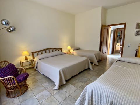 Quadruple Room | Down comforters, blackout drapes, free WiFi