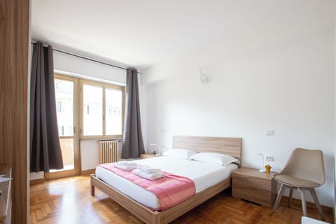 Comfort Room, Balcony, City View | Desk, laptop workspace, blackout drapes, iron/ironing board