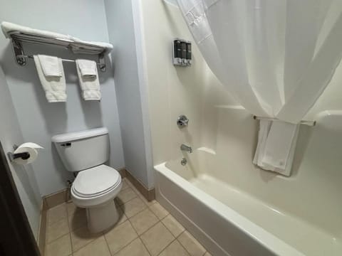 Combined shower/tub, hair dryer, towels, soap