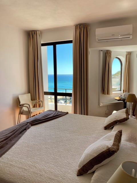 Deluxe Double Room, Balcony, Beach View | In-room safe, desk, free WiFi