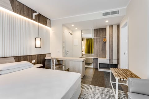 Junior Studio Suite, Balcony, Lakeside | In-room safe, desk, blackout drapes, soundproofing