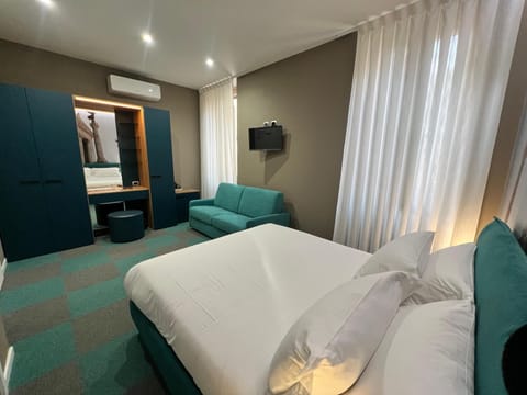 Deluxe Double Room, 1 King Bed with Sofa bed, Non Smoking | Free minibar, desk, laptop workspace, iron/ironing board