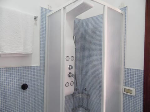 Exclusive Double Room, City View | Bathroom | Shower, hair dryer, towels, soap