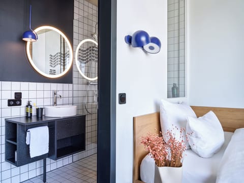 Design Studio | Premium bedding, desk, laptop workspace, blackout drapes