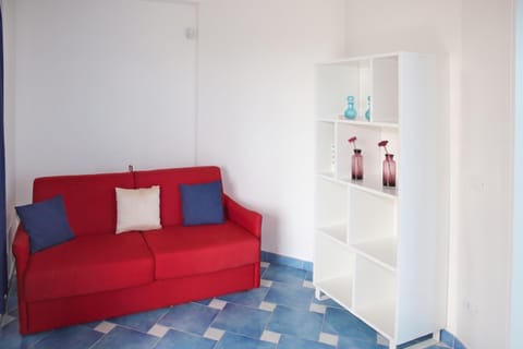Family Villa, Multiple Bedrooms, Balcony (Villa Fortunata) | Living area | Flat-screen TV