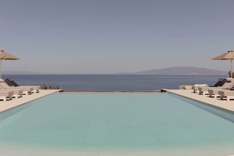 Seasonal outdoor pool, pool umbrellas, sun loungers