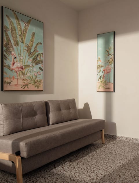 Deluxe Suite, Balcony | Living area