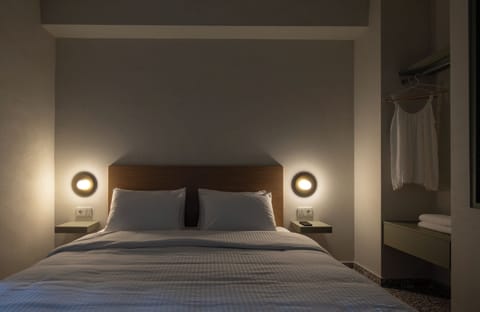 Deluxe Suite, Balcony | In-room safe, blackout drapes, soundproofing, iron/ironing board