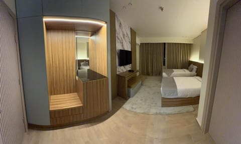 City Room | Premium bedding, memory foam beds, laptop workspace, blackout drapes