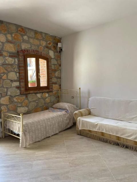 Family Suite, Balcony, Sea View | Living area | 40-cm flat-screen TV with cable channels