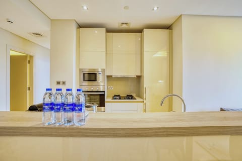 Luxury Apartment, Multiple Beds, Sea View, Beachfront | Private kitchen | Full-size fridge, microwave, oven, stovetop