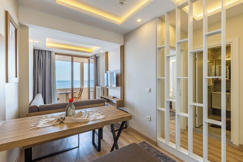 Junior Suite, Balcony, Sea View | Living area | 32-inch LCD TV with satellite channels, Netflix, streaming services