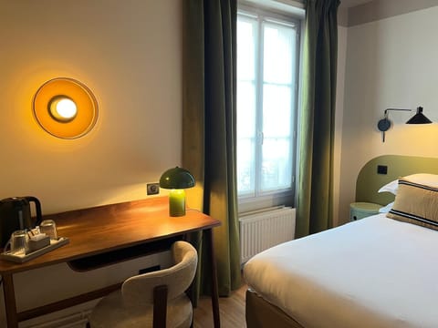 Standard Double Room | Minibar, in-room safe, desk, blackout drapes