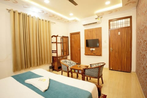 Deluxe Double Room, Balcony, City View | Desk, laptop workspace, free WiFi