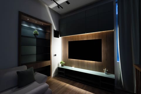Deluxe House, 4 Bedrooms | Living area | Flat-screen TV