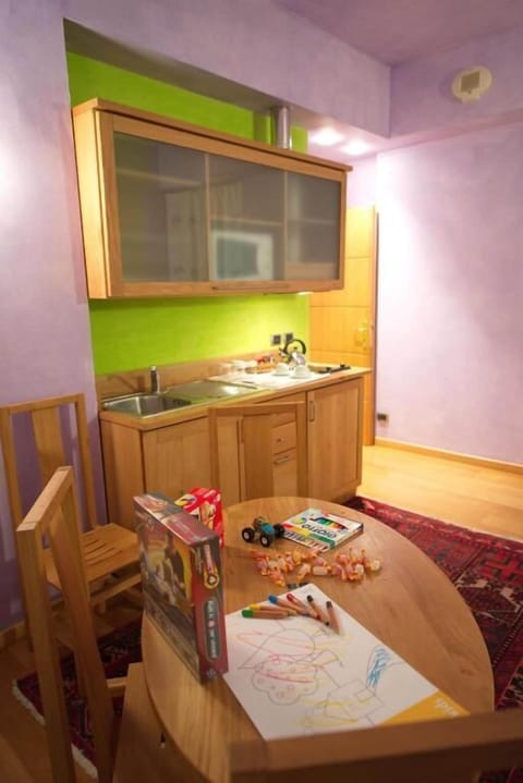 Mini-fridge, microwave, stovetop, cookware/dishes/utensils