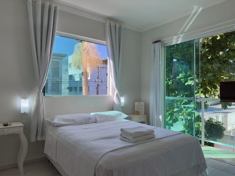 Standard Triple Room, Garden View | Individually furnished, desk, laptop workspace, free WiFi