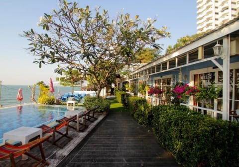 Outdoor pool, open 6:00 AM to 10:30 PM, sun loungers