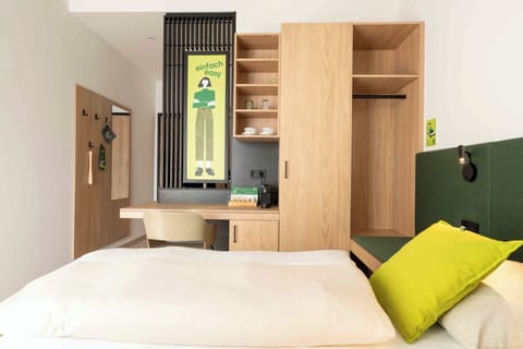 Desk, laptop workspace, free WiFi, bed sheets