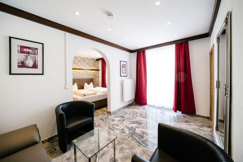 Deluxe Double Room (Balcony) | Living area | 32-inch flat-screen TV with satellite channels, TV