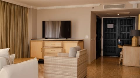 Junior Suite Ocean View King | Living area | 37-inch flat-screen TV with cable channels, TV, iPod dock