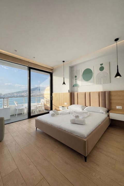 Deluxe Double Room, Balcony, Sea View | Iron/ironing board, bed sheets