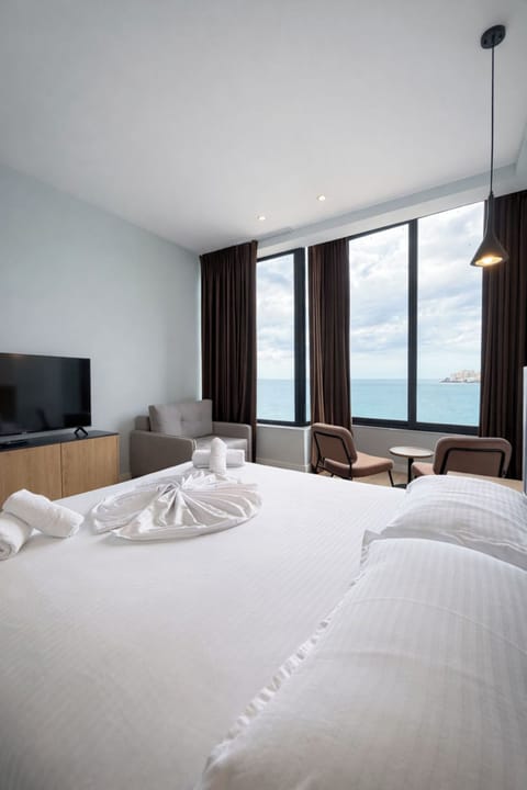Deluxe Double Room, Sea View | Iron/ironing board, bed sheets