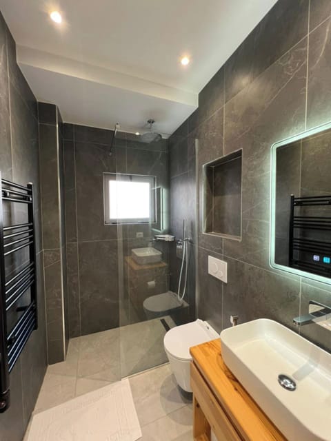 Suite, Balcony, Sea View | Bathroom | Shower, hair dryer, towels, toilet paper