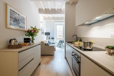 Family Condo | Private kitchen | Mini-fridge, microwave, stovetop, electric kettle