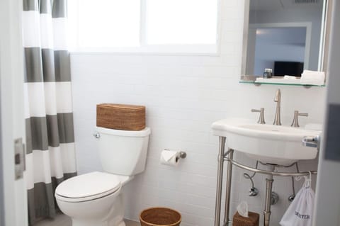 Shower, designer toiletries, hair dryer, bathrobes