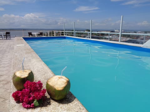 Outdoor pool, open 7 AM to 10:00 PM, sun loungers
